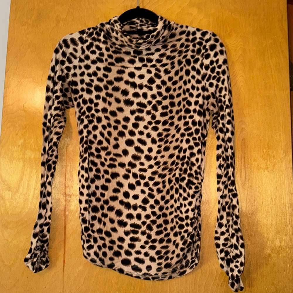 Used cheetah print turtle neck in size L
